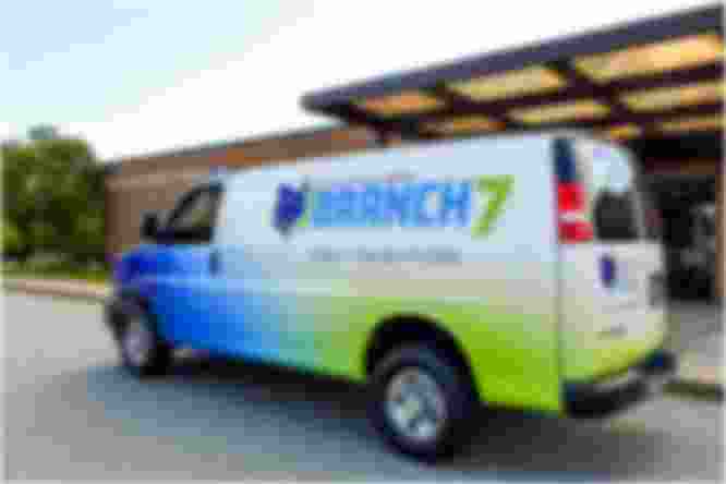 Branch7 Outreach Van parked in front of Cranston Public Library's Central location